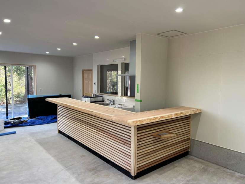 The new cedar-topped counter in the shop side of the Hakuba snowboard factory workshop.